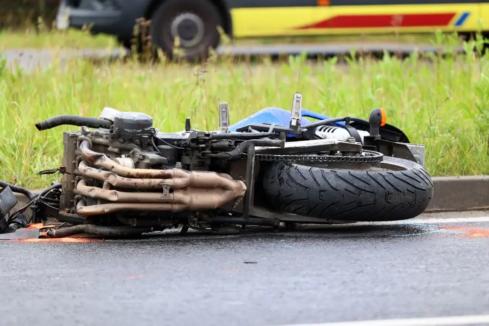 A motorcyclist receiving medical attention and legal guidance after an accident to ensure full recovery.